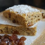Banana Cake Squares topped with a Marmalade Glaze and showered in Coconut.