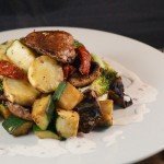 Roasted Seasoned Portobello Mushrooms & Courgettes, with Sweet Potatoes, Broccoli & Sun Dried Tomatoes finished with a Chili & Chive Tahini Dressing