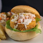Spicy Veggie Quarter Pounder with Pico de Gallo, Jalapeno Tahini Sauce and Herb Potato Wedges