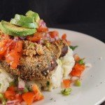 Chilli Battered Aubergine Slices served with Spring Onion Mash topped with pico de gallo and slices of Avocado